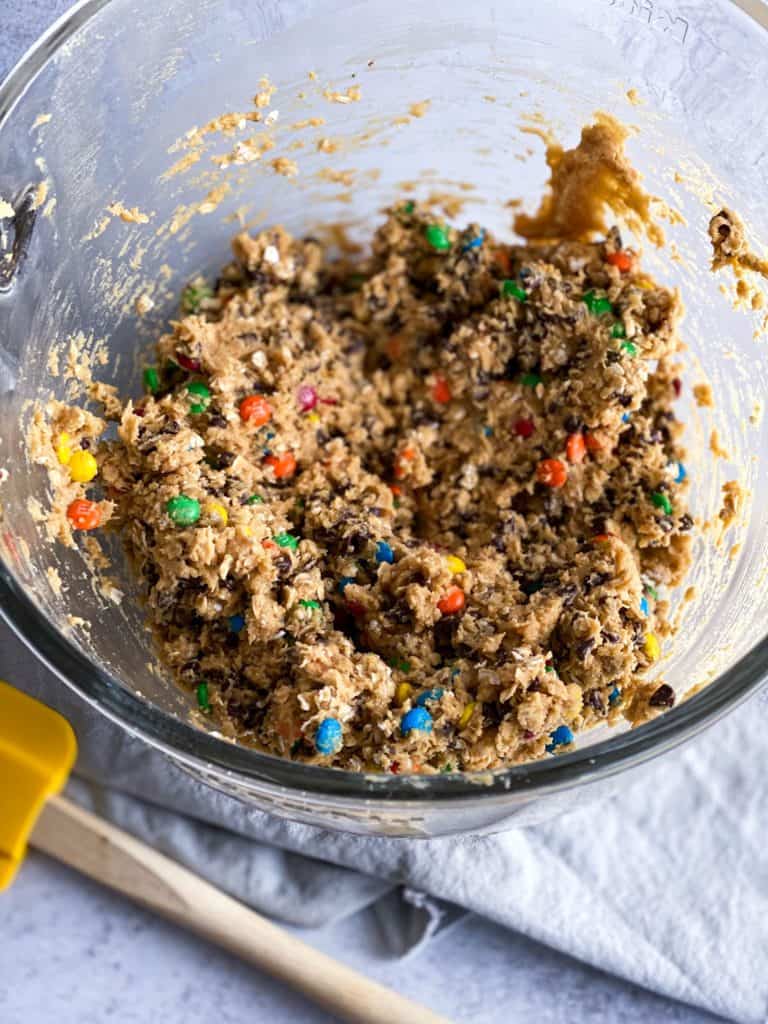 monster cookie dough in a glass bowl