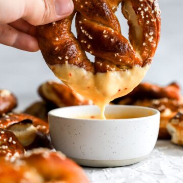 Easy soft buttery pretzels dipped in the spicy nacho cheese sauce made with extra butter.