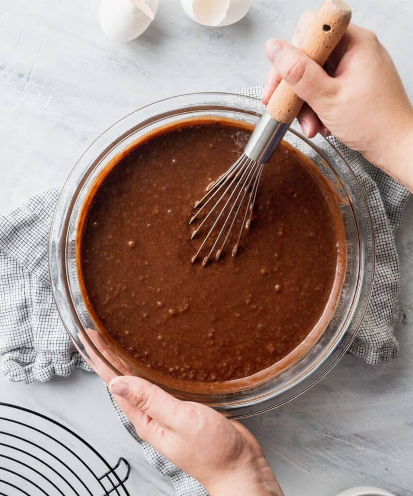 chocolate cake batter in a glass bowl.