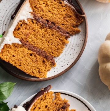 close up of moist pumpkin chocolate chip cake on plates.