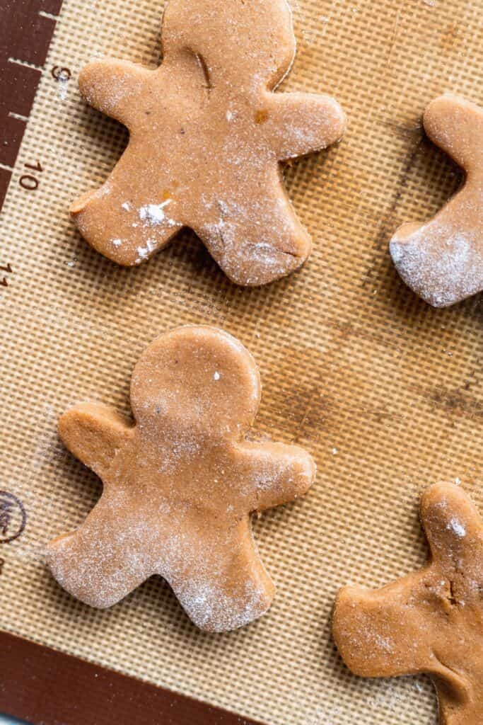 Gingerbread men on a cookie sheet.