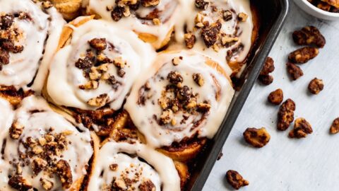 Walnut cinnamon rolls with sweet maple nuts on top.