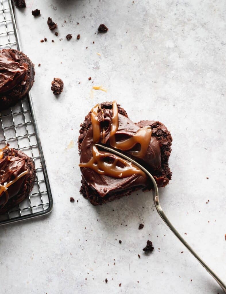 Brownie heart with a fork inserted.