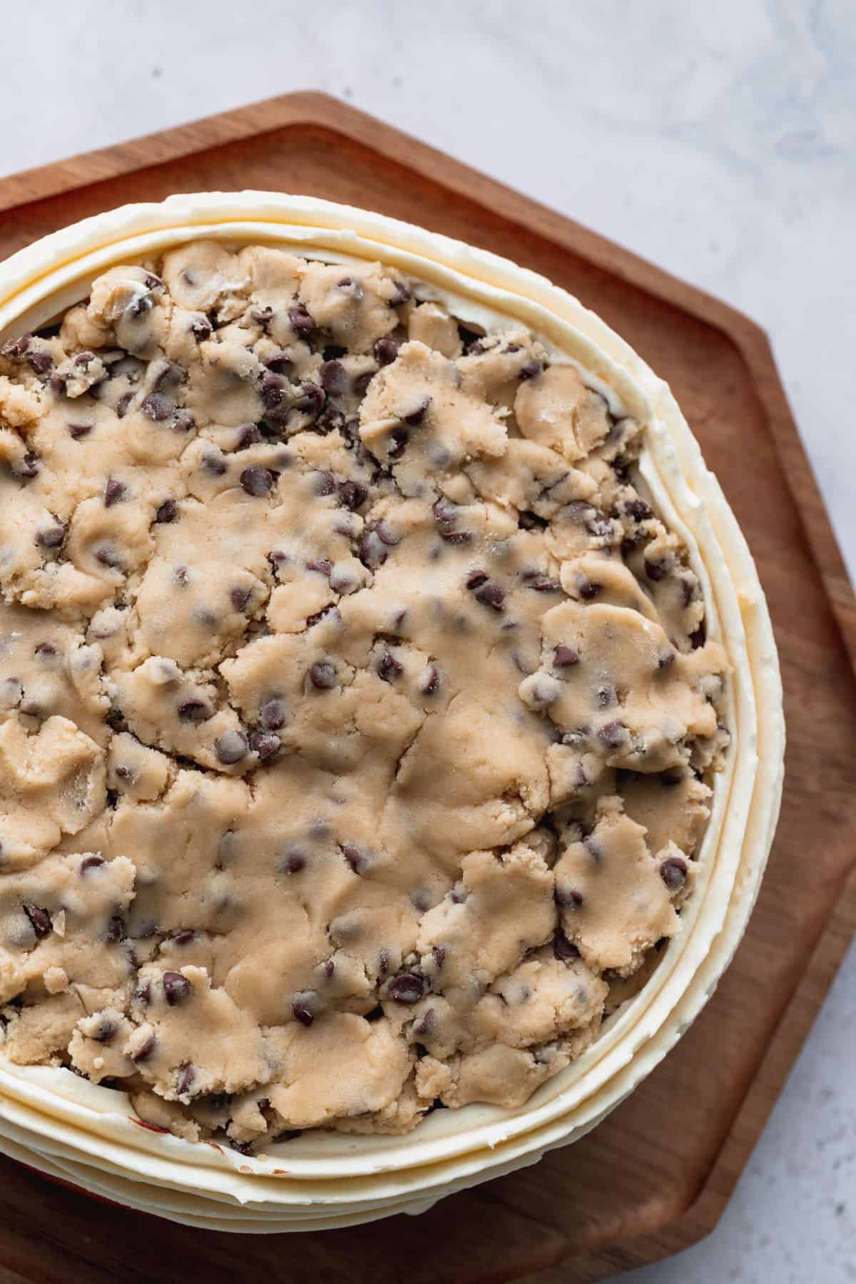 Edible cookies dough on top of cake.