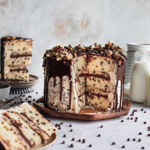 Slices missing from cookie dough cake.