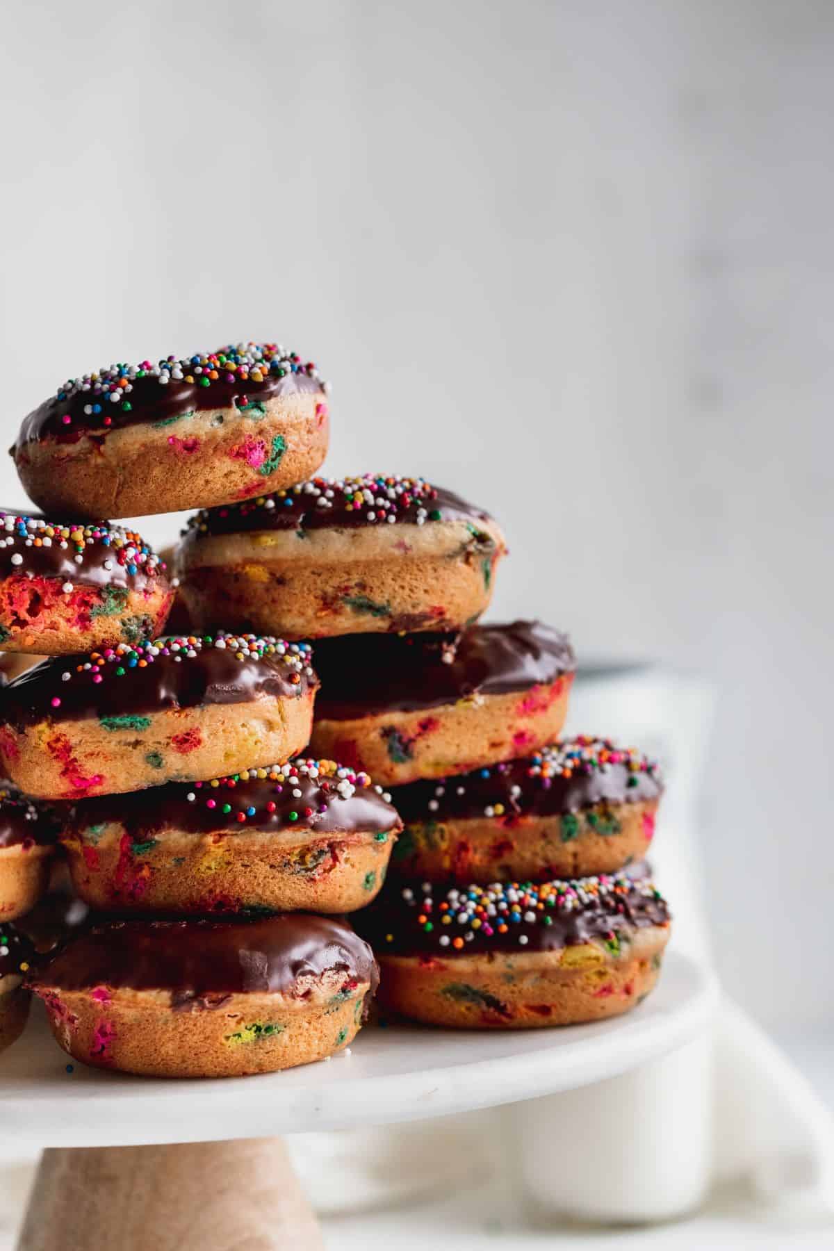 Tower of birthday cake donuts.