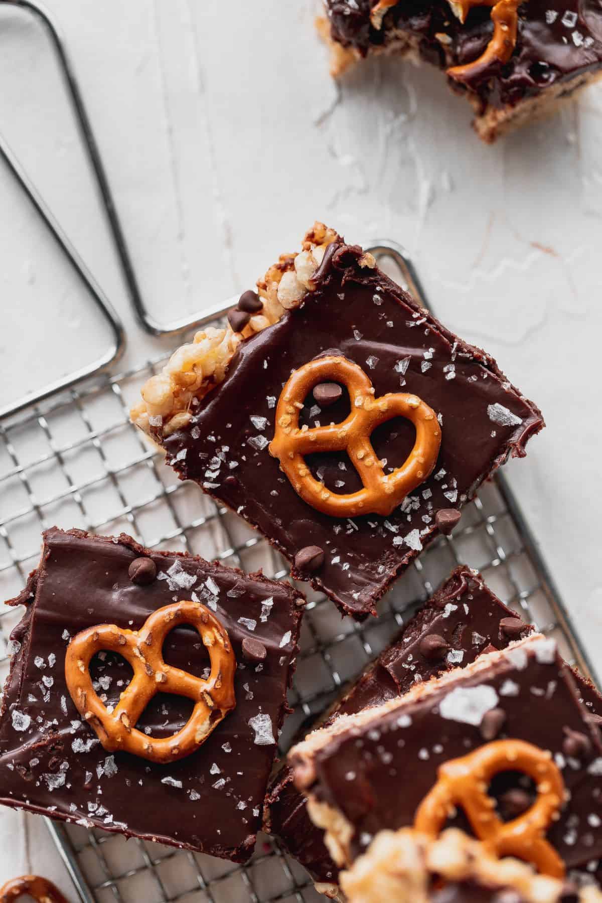 Close up of chocolate covered rice krispie treats.