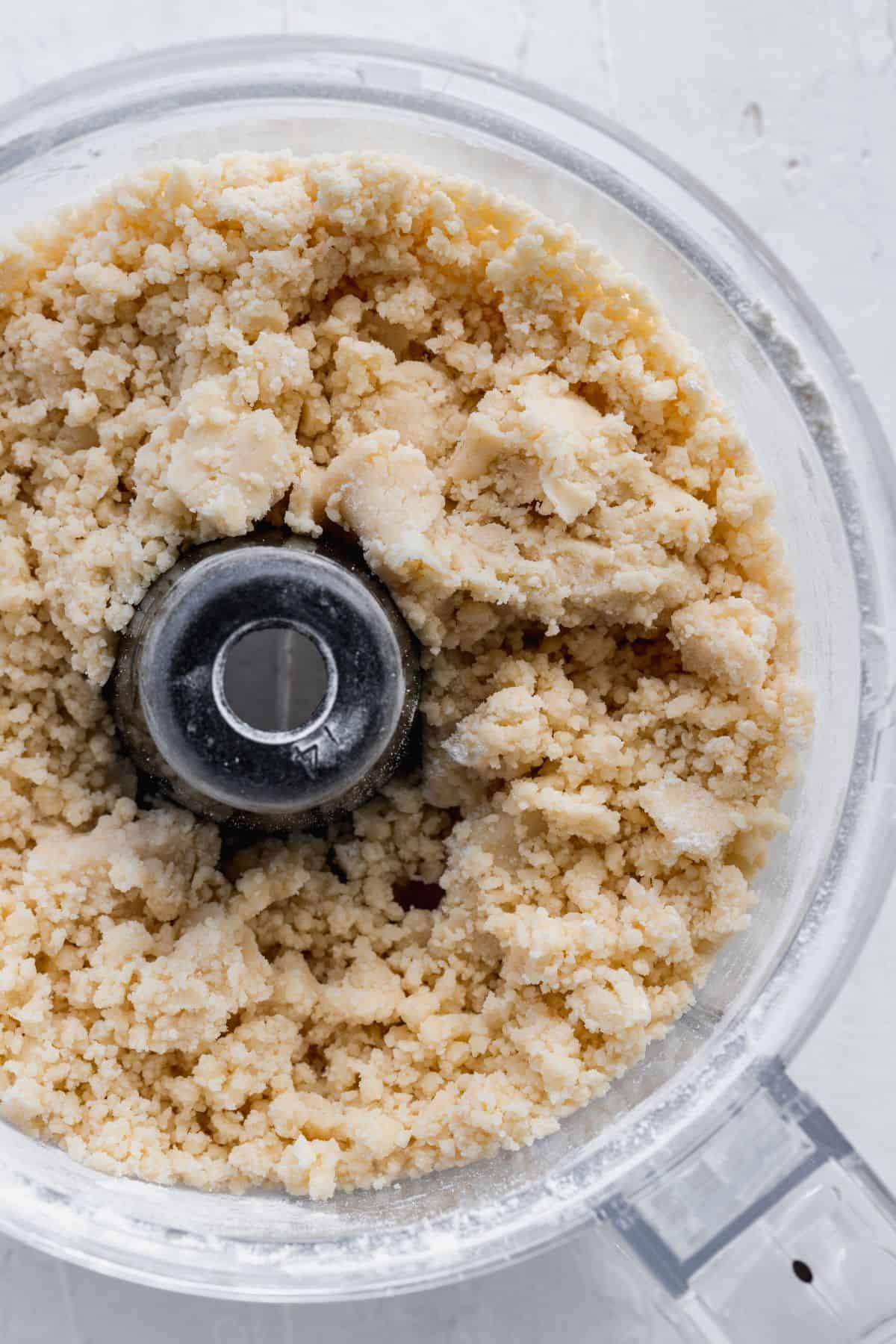 Pie dough in a food processor.