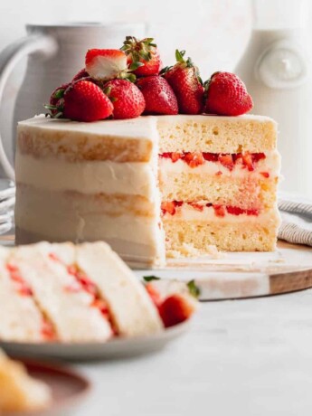 Cut open strawberry semi-naked cake