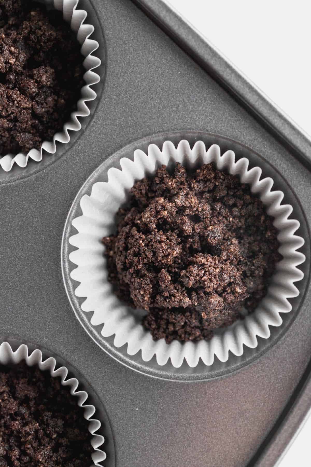 Oreo crust in pan.