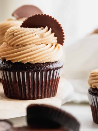 Peanut butter chocolate cupcakes on a platter.