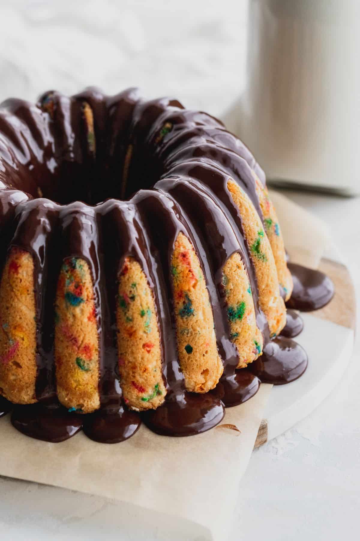 Chocolate poured all over bundt cake.