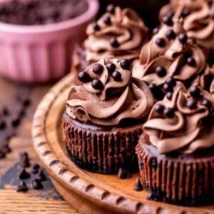 Side view of mini chocolate cheesecakes.