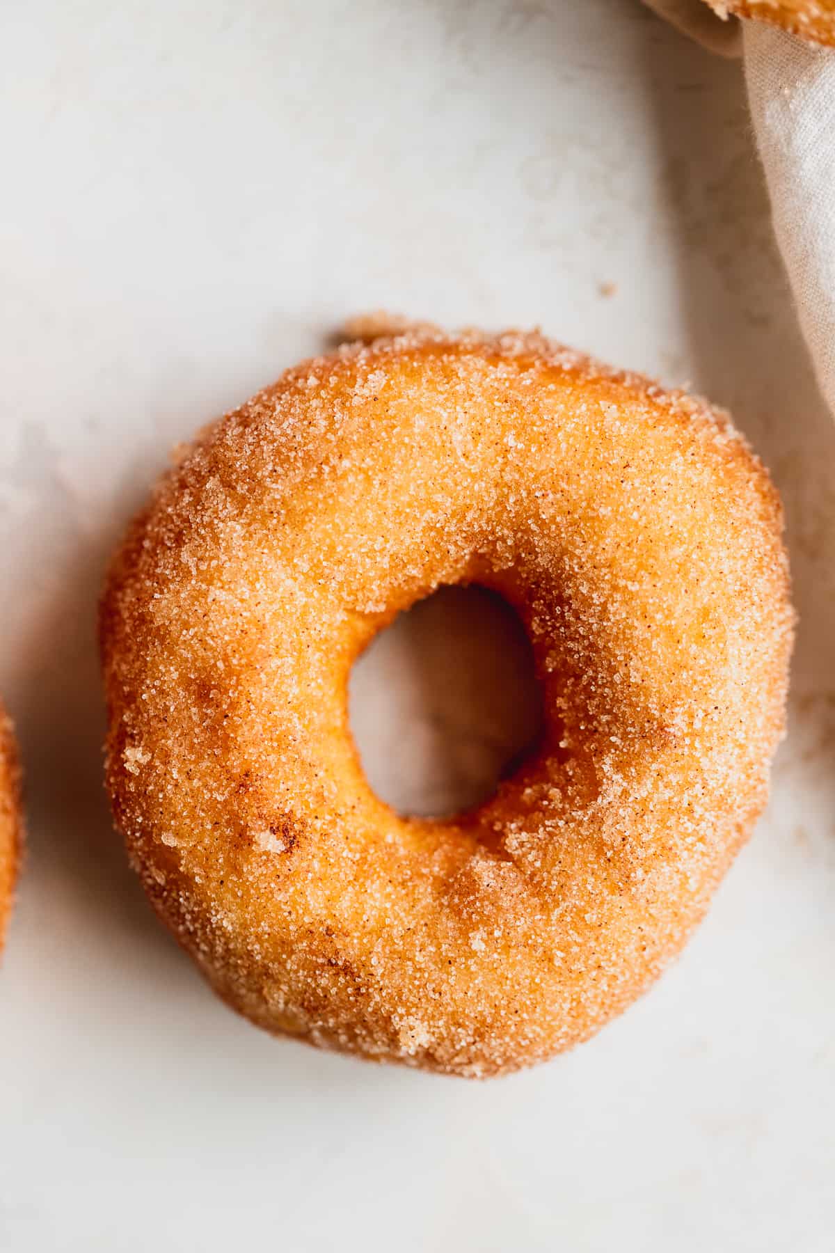 Single doughnut by itself.