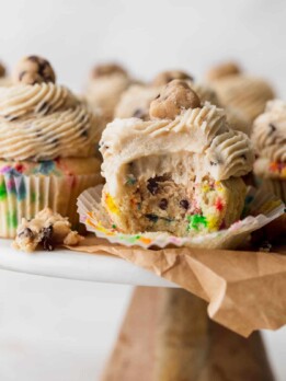 Bite missing from cookie dough cupcakes.