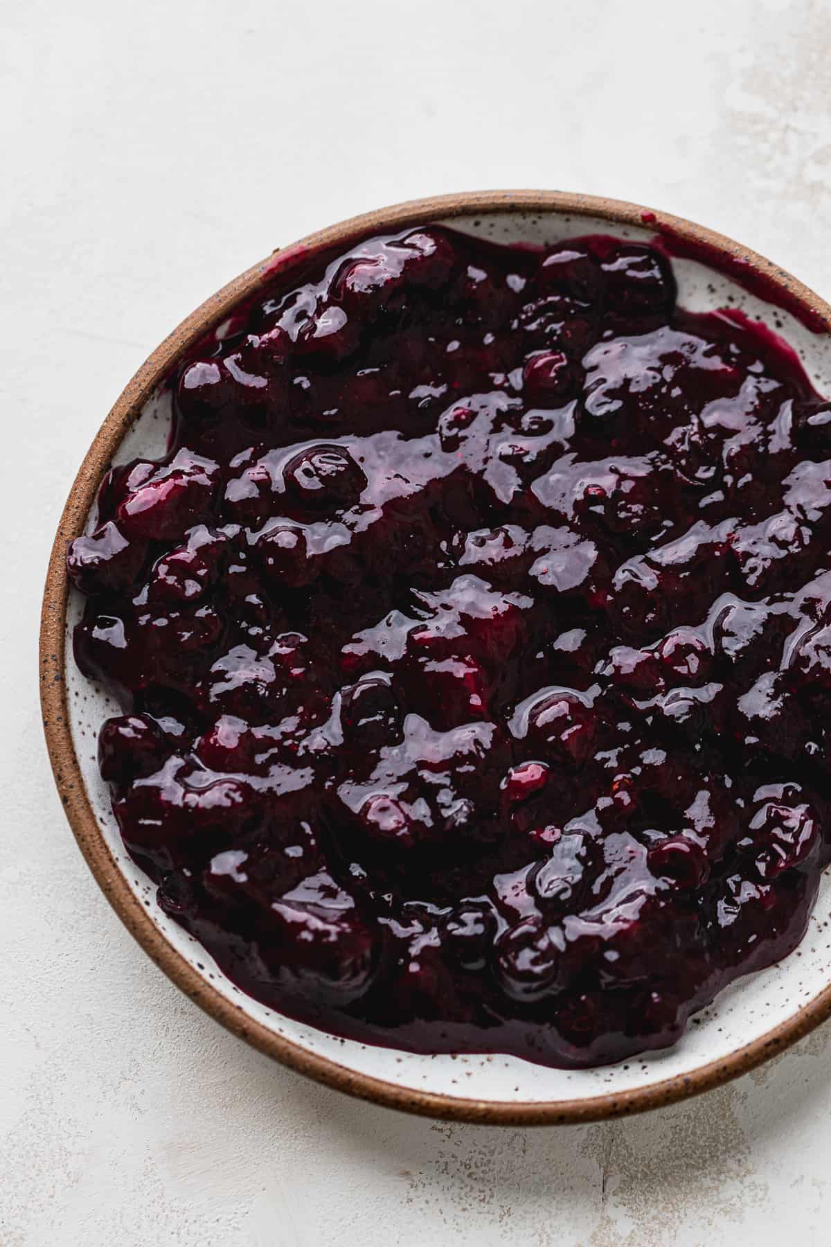 Blueberry filling on plate.