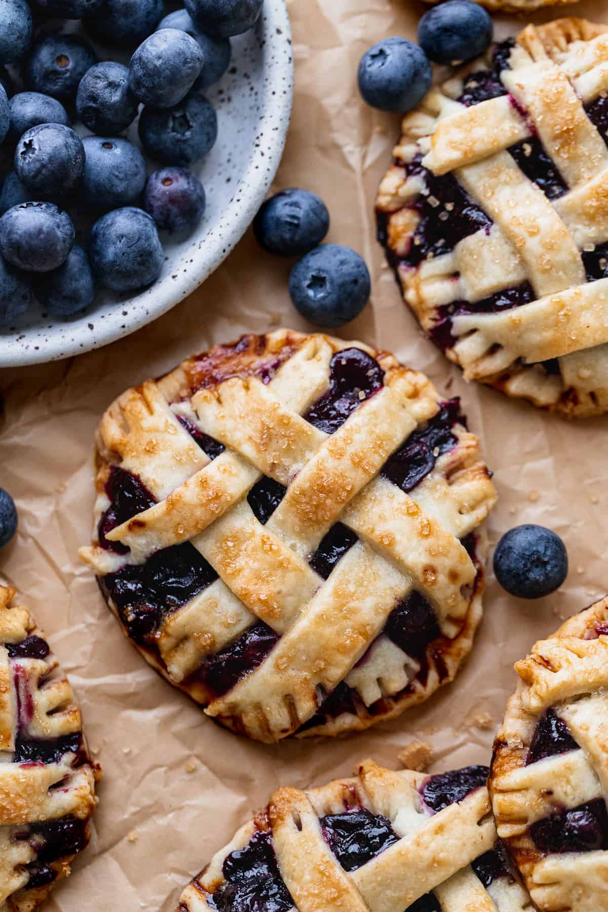 Pies on parchment paper.