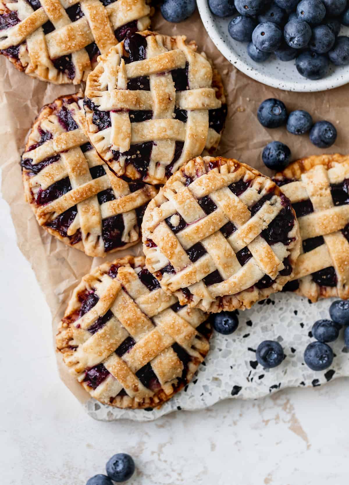 Pies on cutting board.