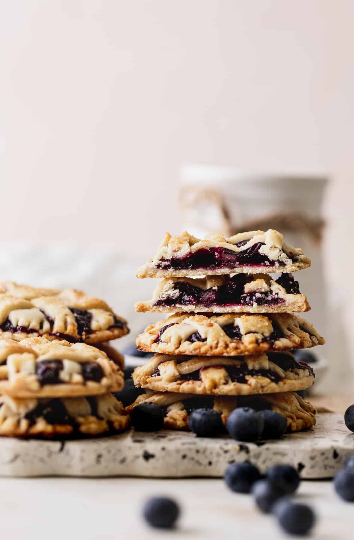 Stack of pies with one split in half.