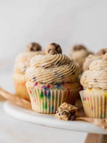 Close up of cupcake on cake stand.