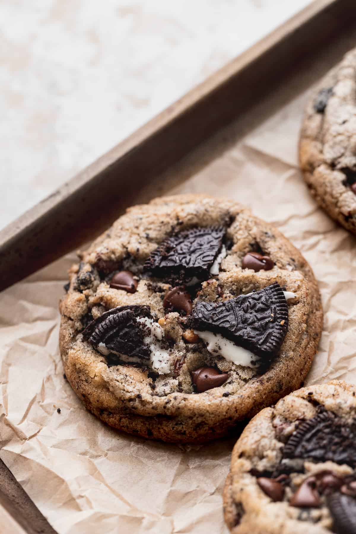 Oreo chocolate chip cookie on parchment paper