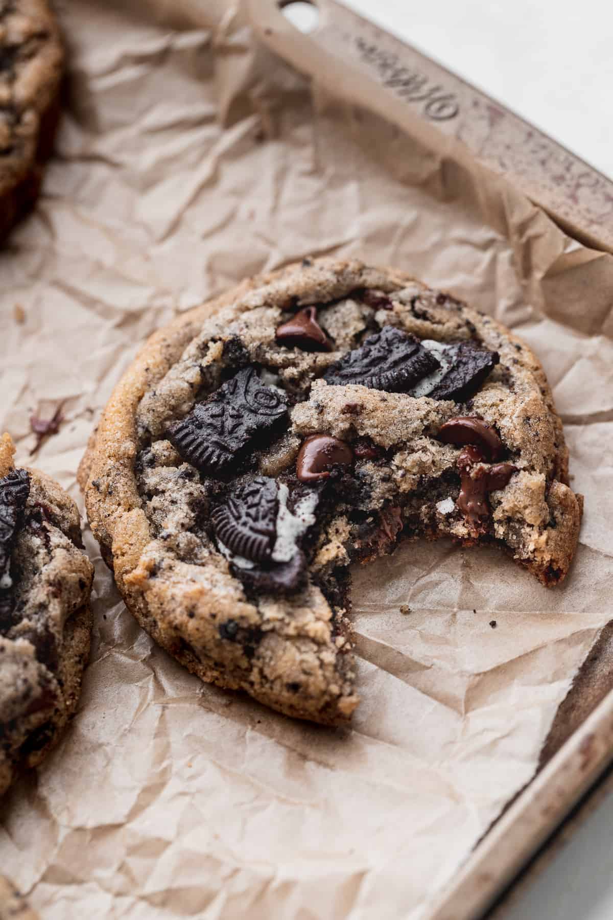 Oreo chocolate chip cookie with a bite missing.