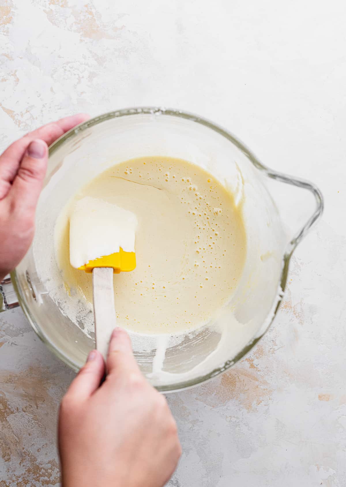 Mixing the egg batter.