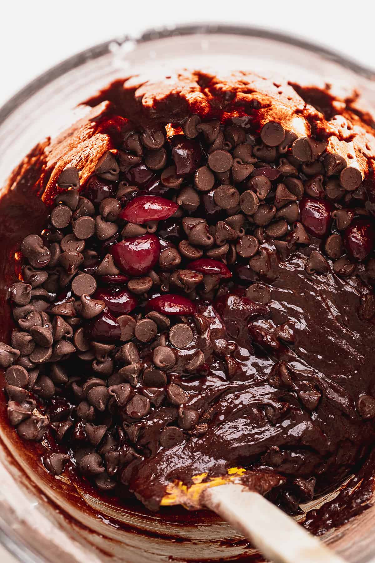 Brownie batter in a glass bowl.