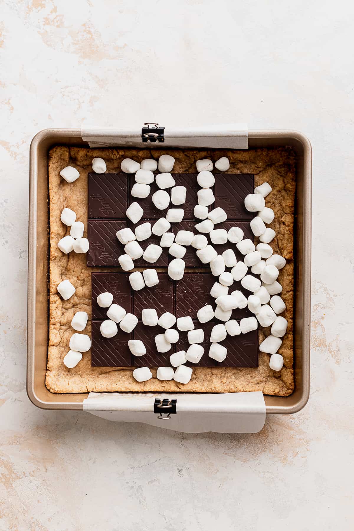 Mini marshmallows in the pan.