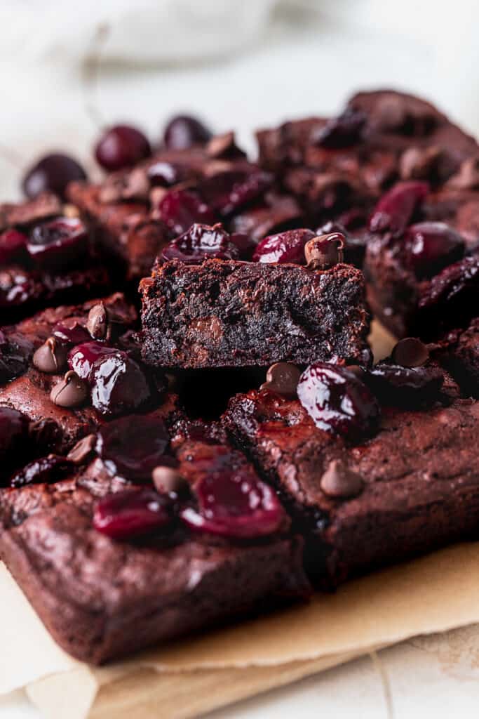 Fudgy roasted cherry brownie's with the side pointed up.