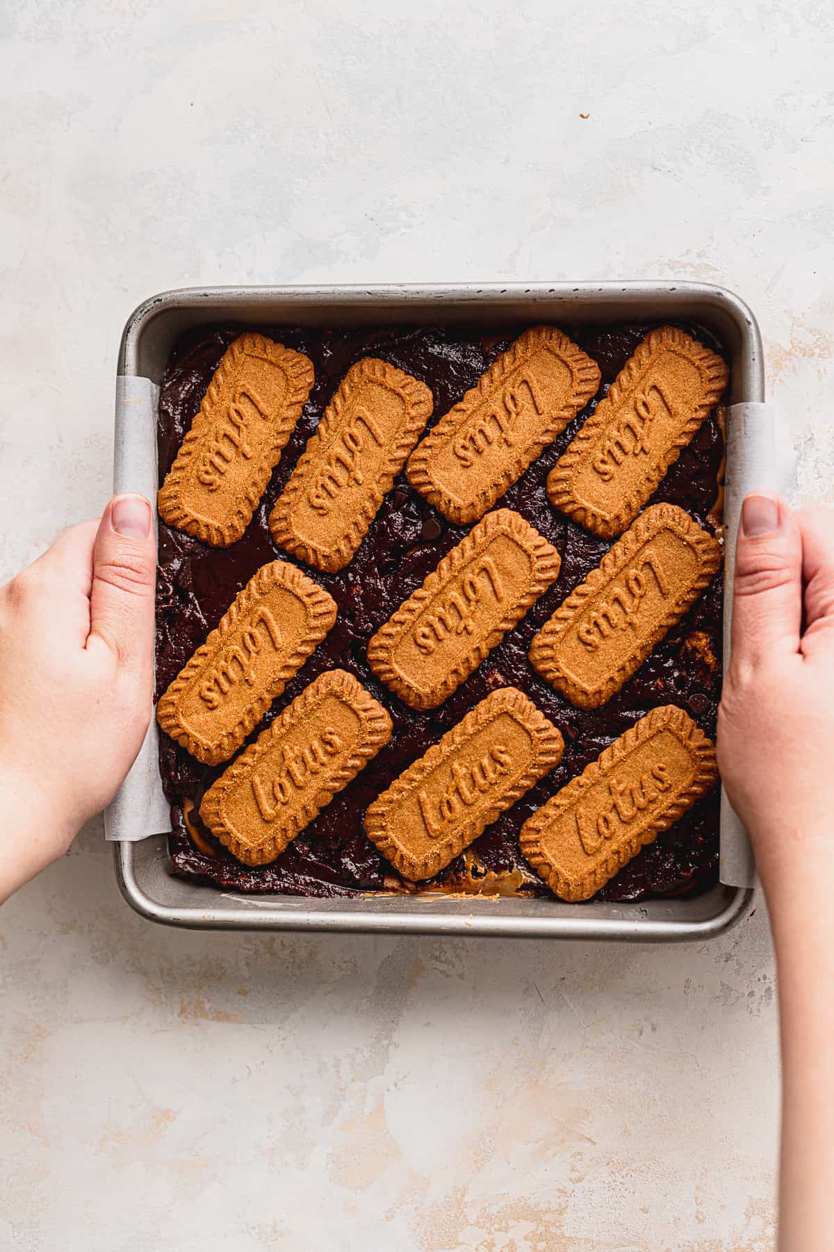 Cookies topped on the brownie batter.