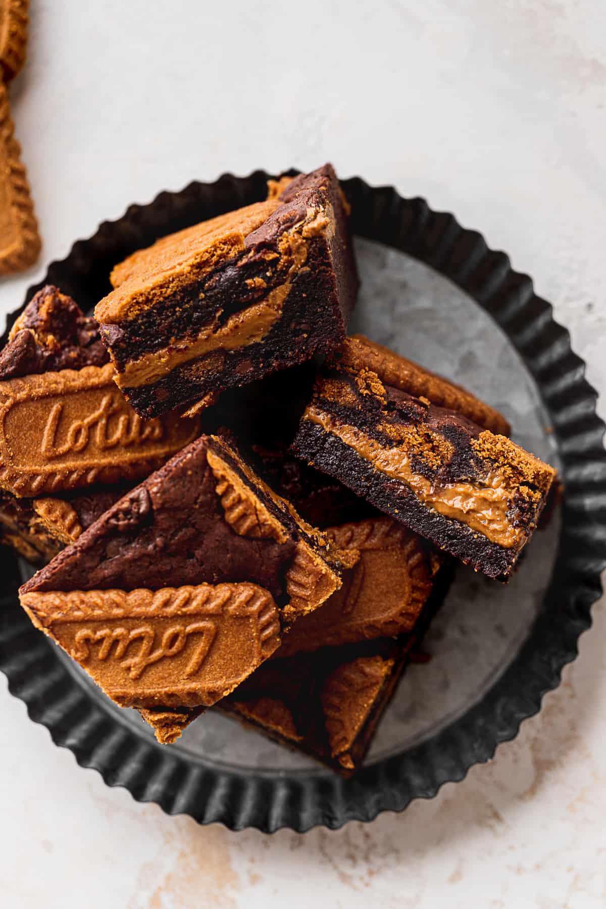 Biscoff brownies on a plate.