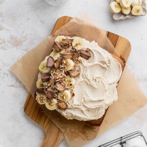 Banana snack cake on a cutting board.