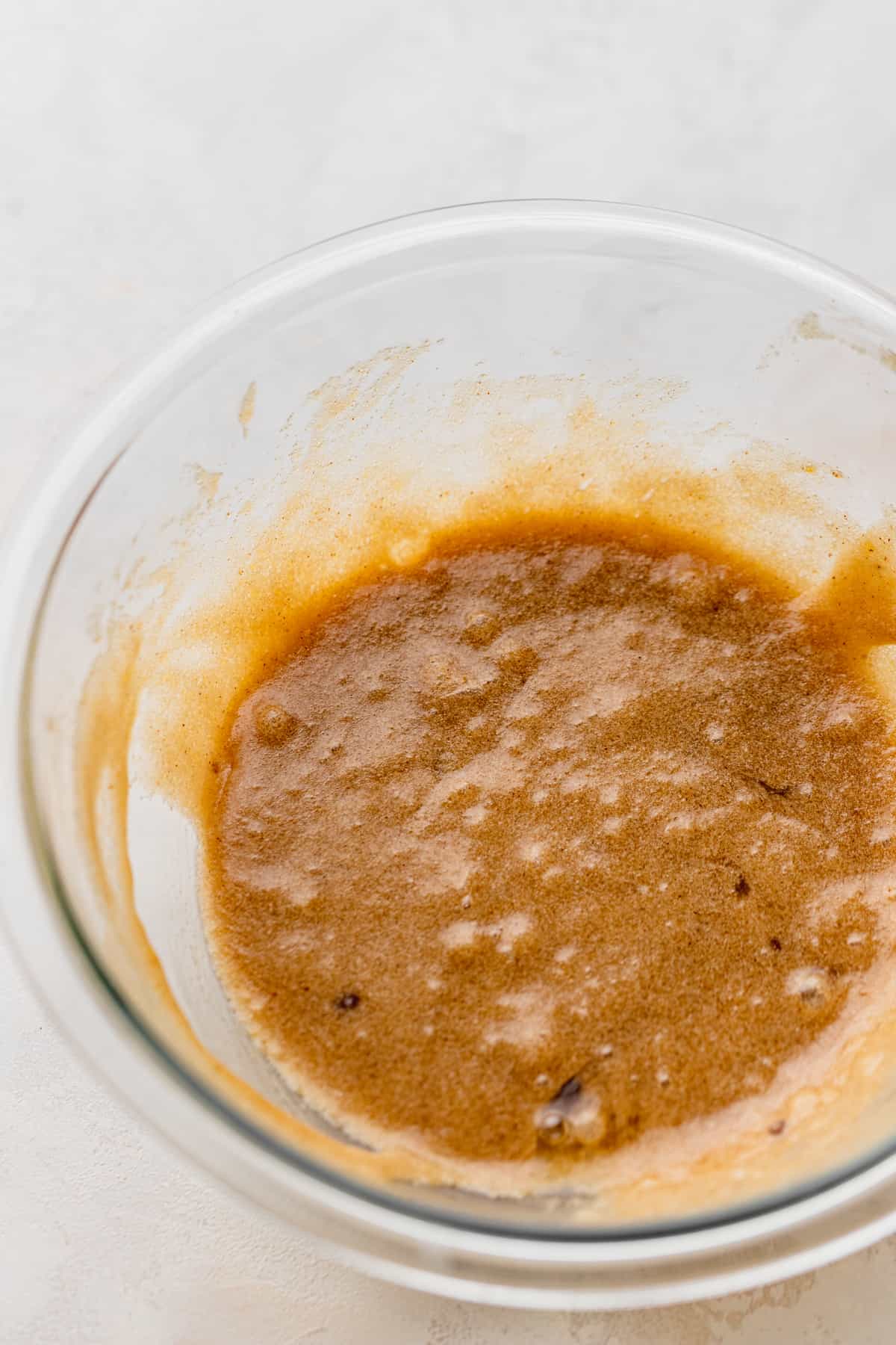 Cookie dough batter in a glass bowl.