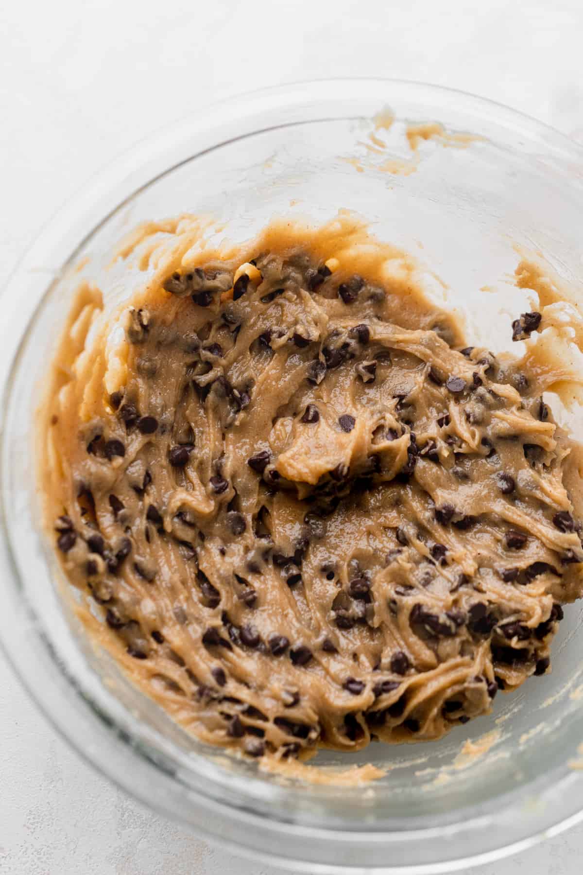 Cookie dough in a glass bowl.