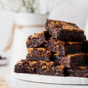 Brown butter brookie bars on a marble board.