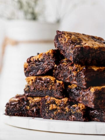 Brown butter brookie bars on a marble board.