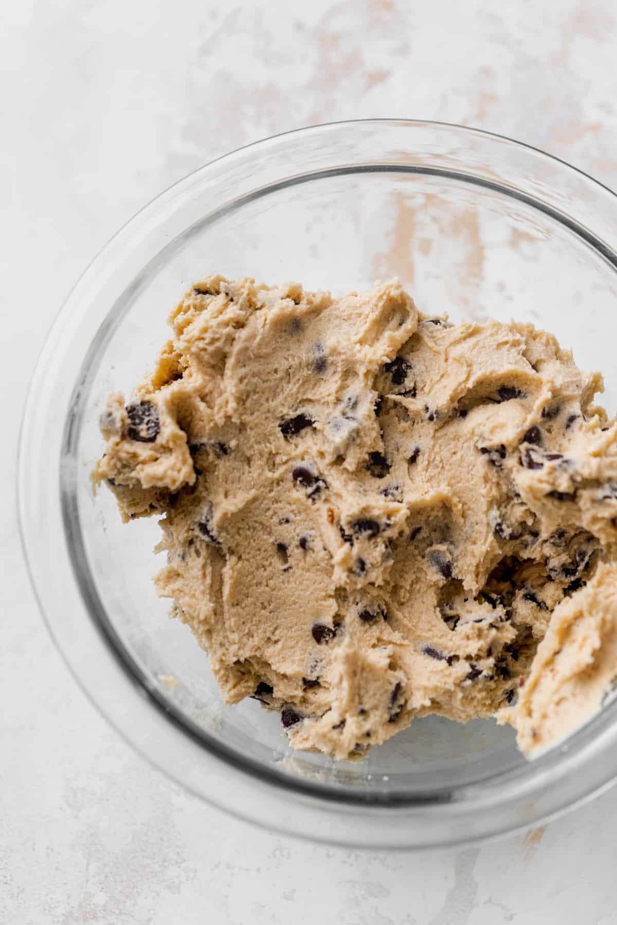 Cookie dough in glass bowl.