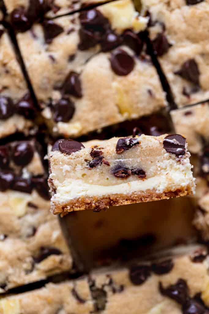 Side view of Cookie Dough Cheesecake Bars.
