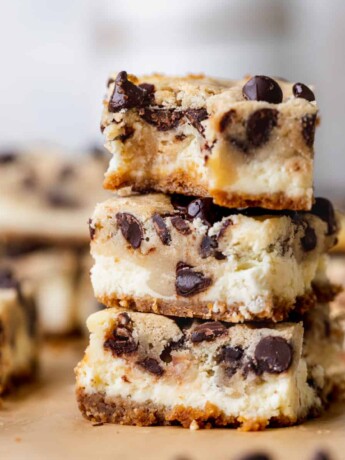 Stack of Cookie Dough Cheesecake Bars.