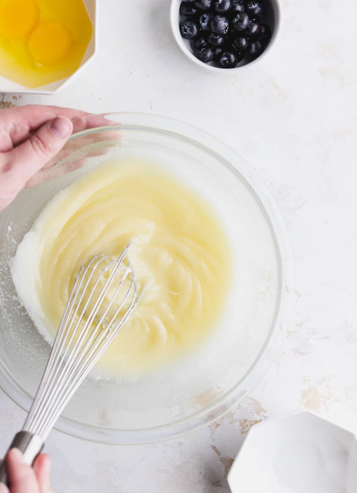 mixing batter in glass bowl.