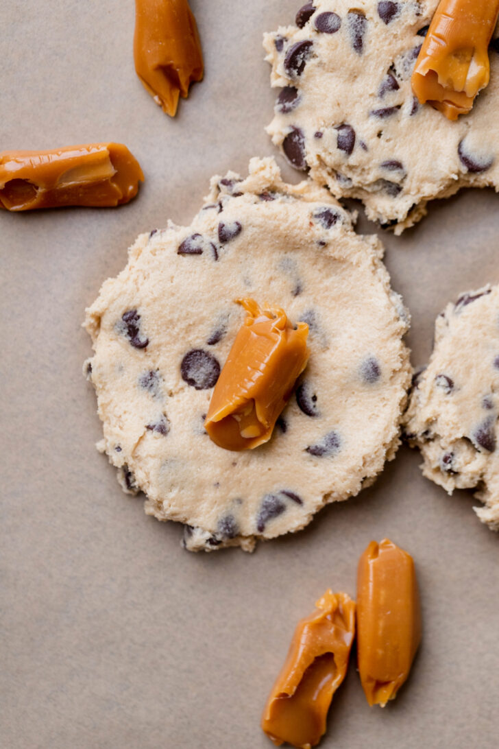 Cookie dough with caramel on top.