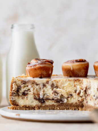 Side view of cinnamon roll cheesecake.