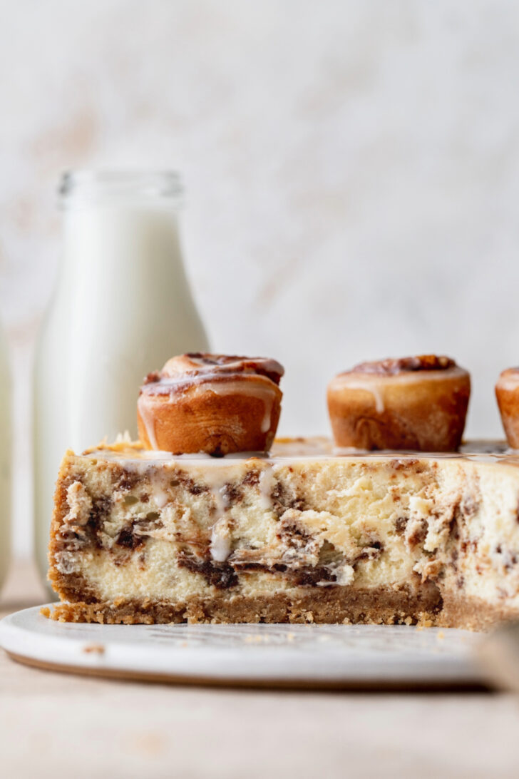 Side view of cinnamon roll cheesecake.