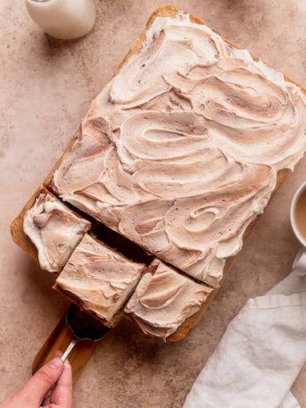 Pulling a slice out of chai spiced sheet cake.