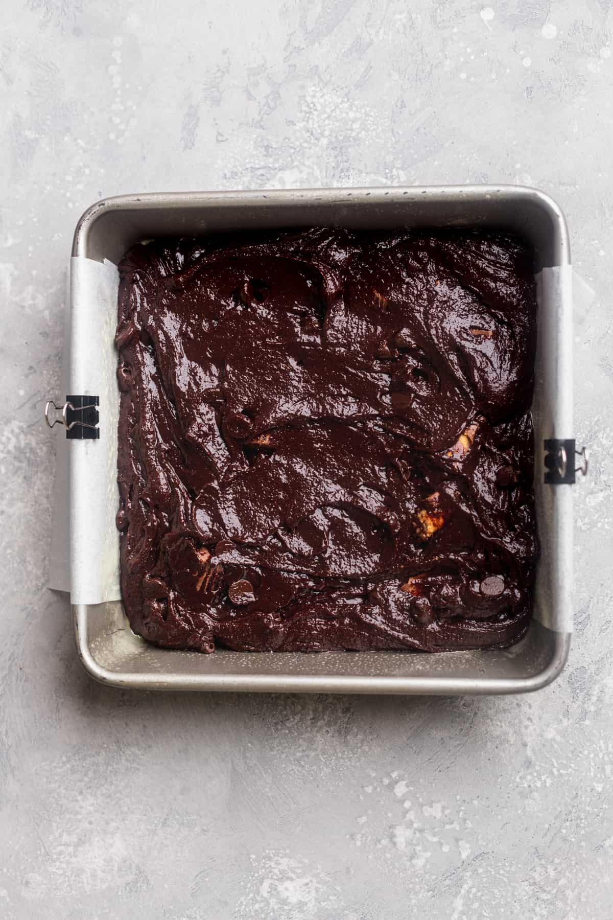 Brownie batter in the pan.