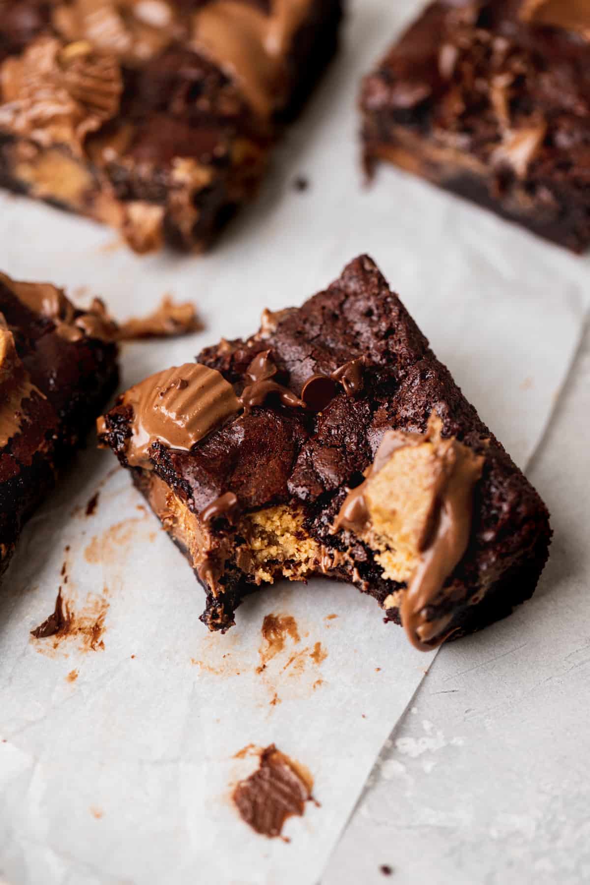 Bite missing from peanut butter cup brownies.