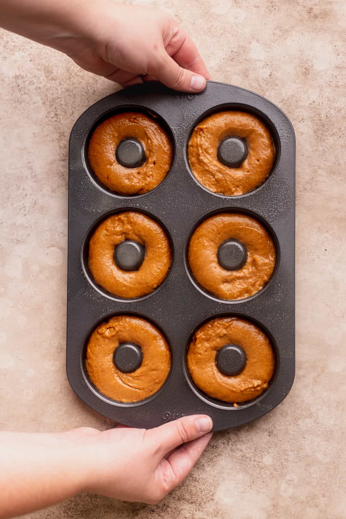 Batter in a donut pan.