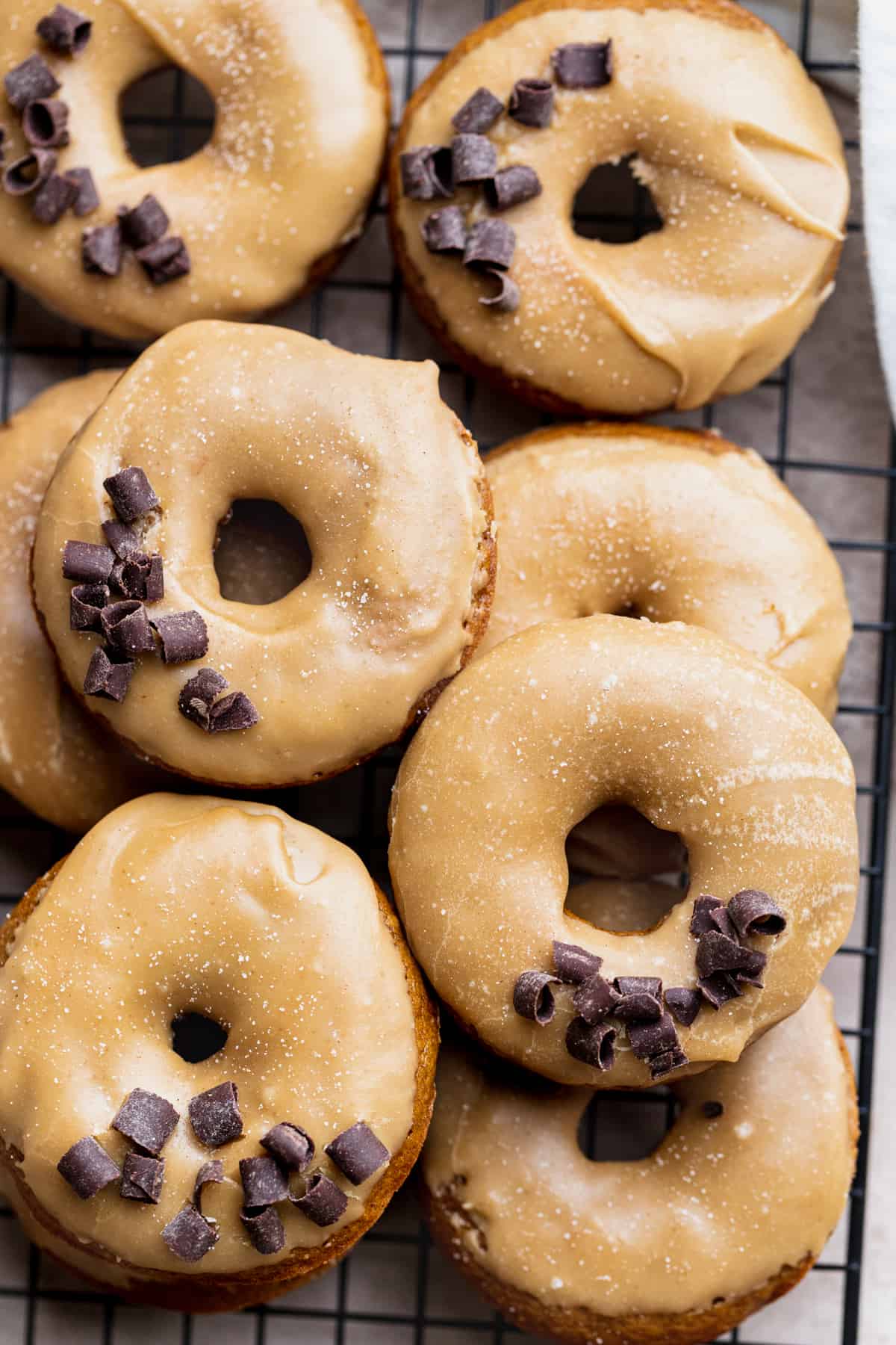 Donuts on a wire rack.