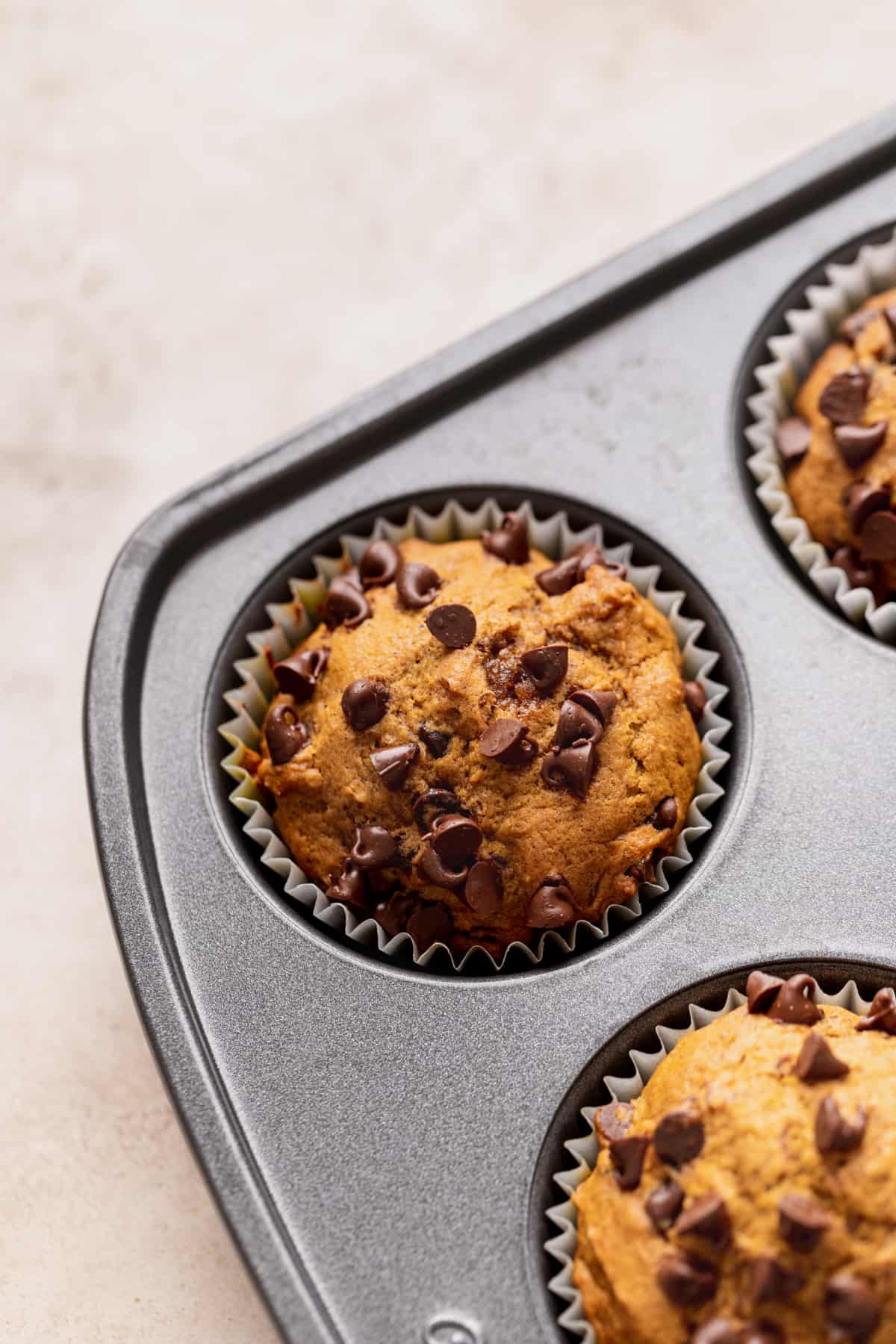 Baked muffins in muffin pan.